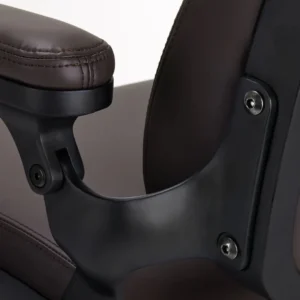 Accoudoir solide et rembourré du fauteuil de coiffure électrique, alliant confort et style professionnel.