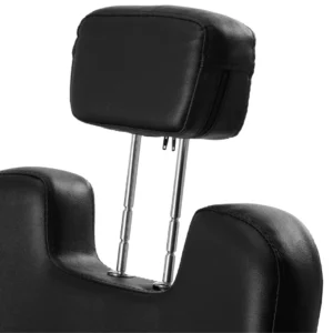 Zoom sur l’appui-tête réglable du fauteuil salon de coiffure, offrant un soutien cervical parfait pour le client